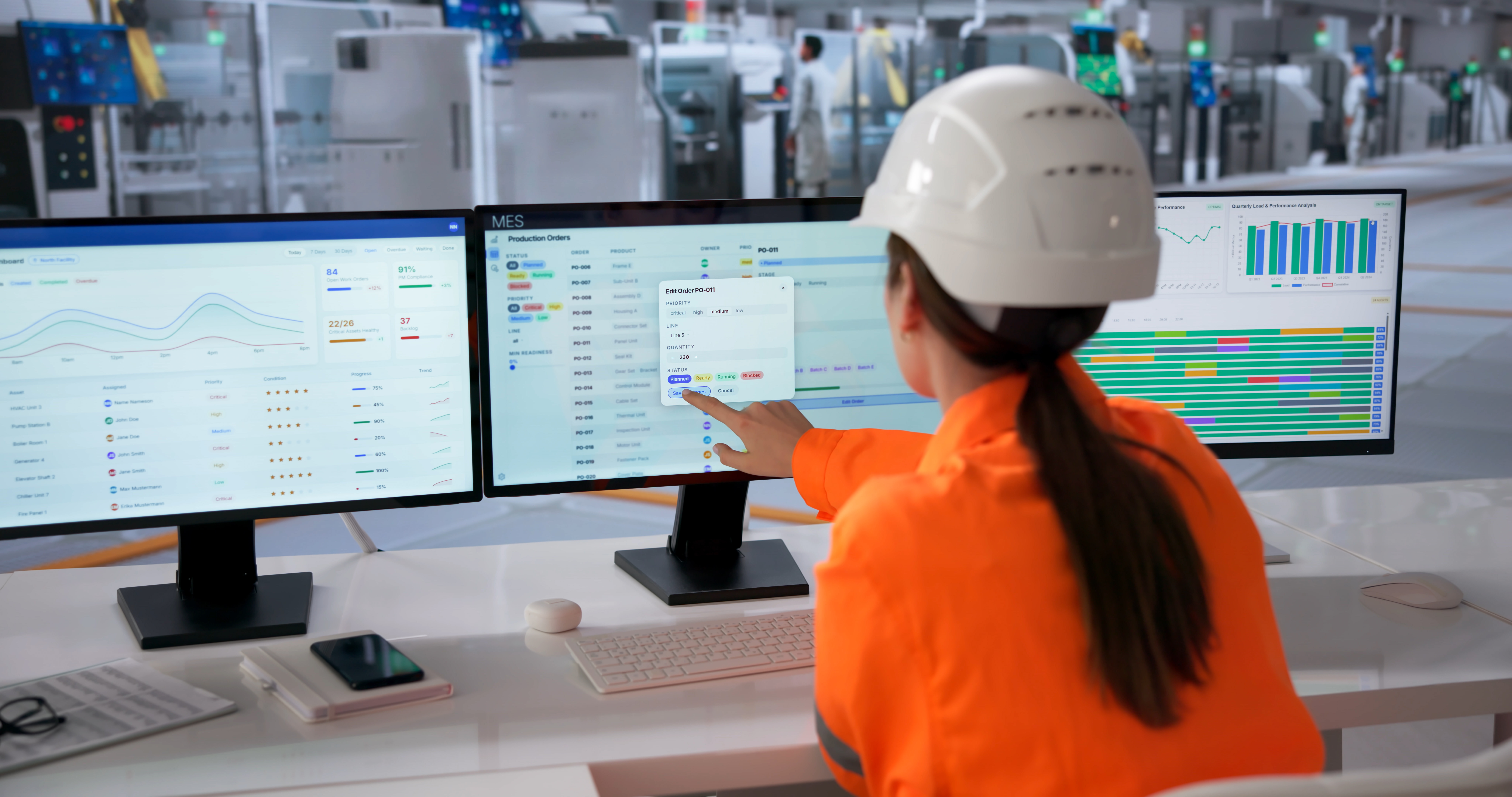 Manufacturing operator reviewing production orders, schedules and performance information.